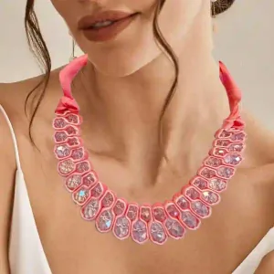 Women's necklace handmade with glass polygonal crystal beads in coral 